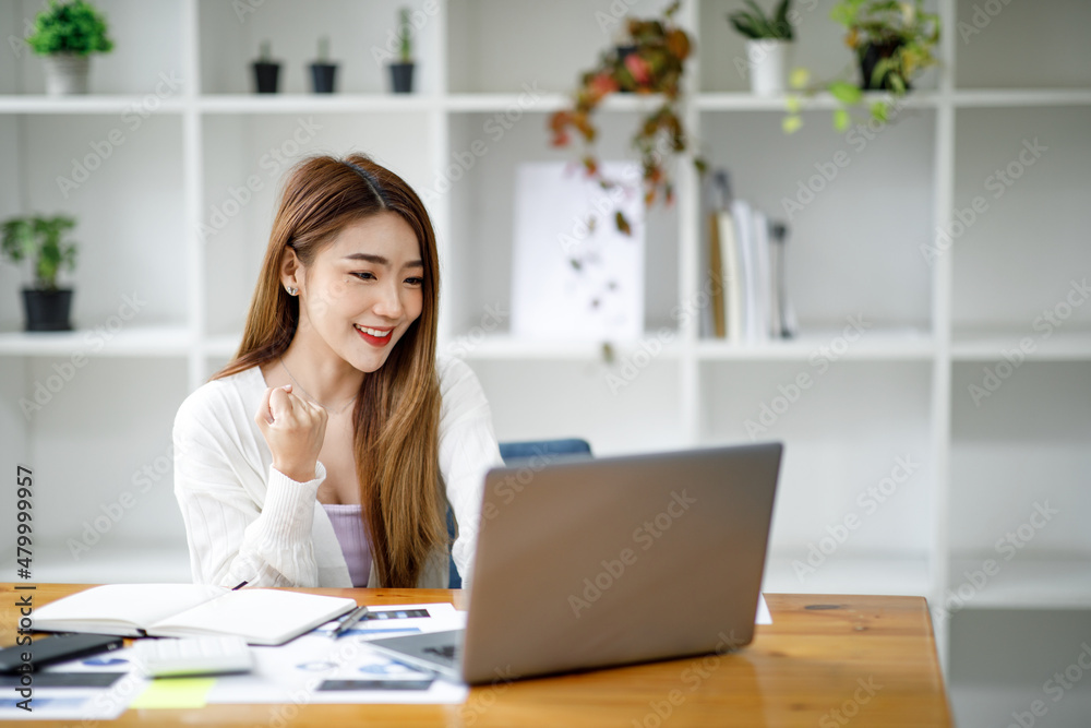 portrait of a businesswoman sitting at her workplace in the office, portrait of a businesswoman sitting at her workplace in the office,