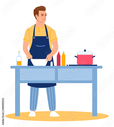 Man washing dishes in sink. After cooking kitchen cleaning concept