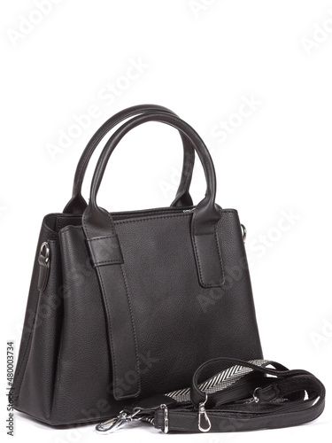 Black large with strap leather woman's handbag isolated on white background © Isolated On White