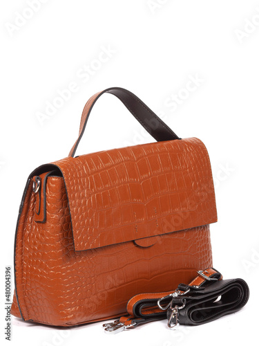 Brown leather woman's handbag isolated on white background