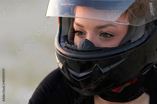 The eyes of a girl in a protective helmet. Close-up. Selective focus. Copy space. © ROMAN DZIUBALO