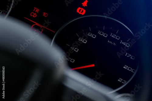 Car dashboard speedometer closeup