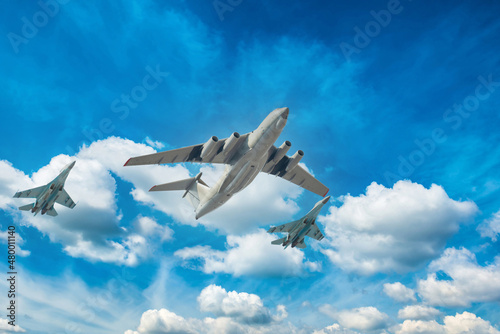 Military jets flying in sky Fotobehang