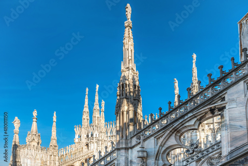 Marble statues - architecture on roof of Duomo cathedral