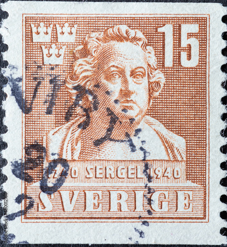 Sweden - circa 1940: a postage stamp from Sweden showing a portrait of the neoclassical sculptor Johan Tobias Sergel (1740-1814) photo