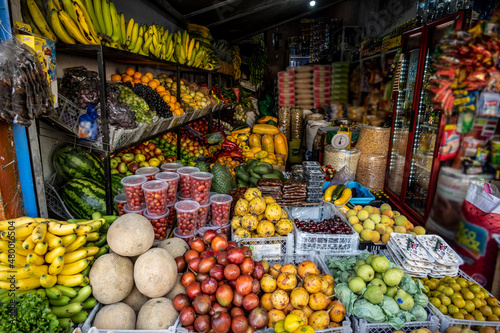 fruit stand with tropical vegetables and fruits  © константин константи
