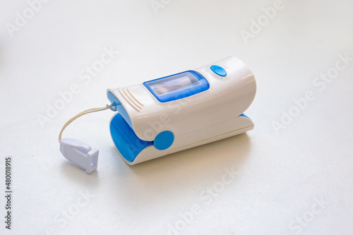 Pulse oximeter on a white table . Equipment for medical institutions.