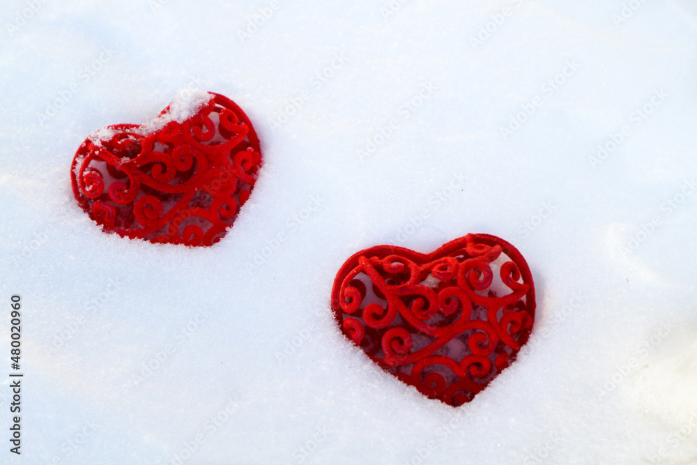 Fototapeta premium two red hearts on a white background