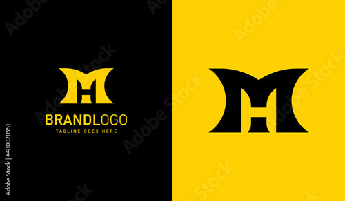 Initial Letter M and H Linked Logo. Black and Yellow Geometric Shape M Letter with Negative Space H Letter inside isolated on Double Background. Use for Branding Logos. Flat Vector Logo Design