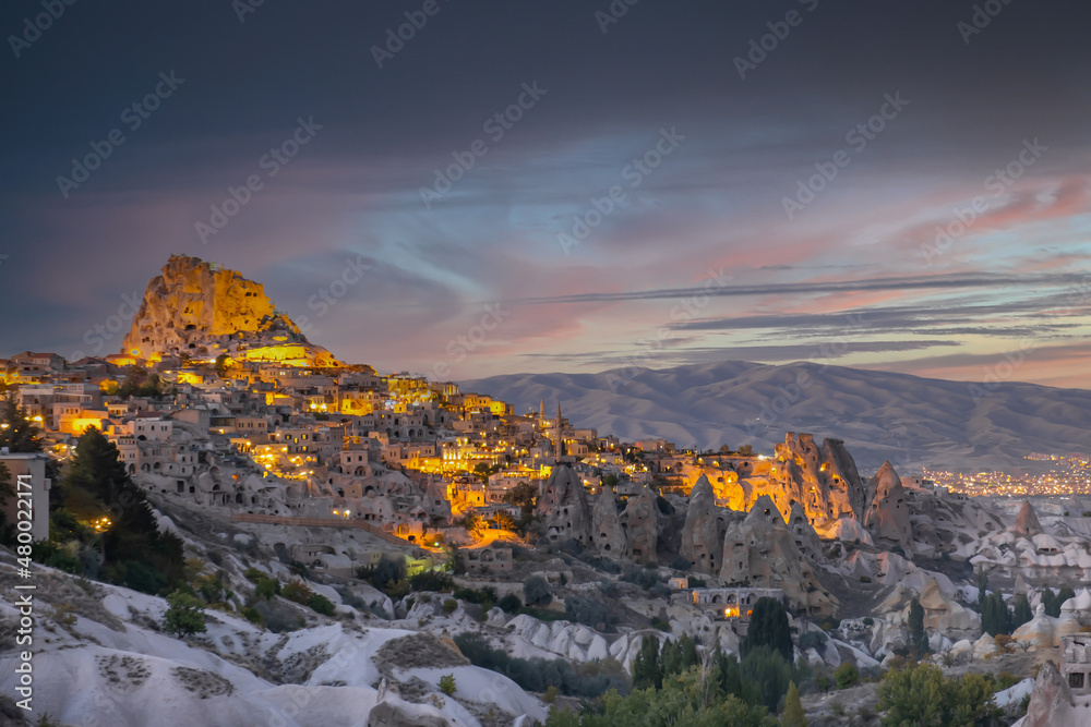 Uchisar Castle in Pigeon Valley, Cappadocia, Turkey. Uchisar Castle is a very popular place for tourists. Fairy chimneys in Pigeon valley. Natural rocks forms, fairy chimneys.