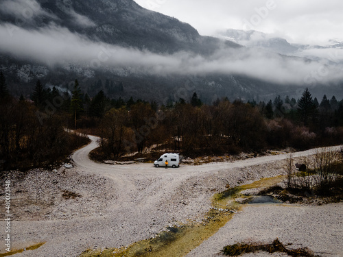 White camper van in front of the julian alps, Slovenia