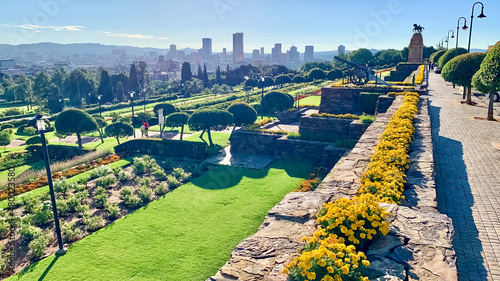 Panoramic view over Pretoria city in South Africa. Union Buildings gardens. photo