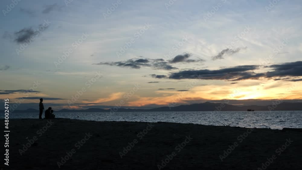 The Mantanani Islands form a small group of three islands off the north-west coast of the state of Sabah, Malaysia, opposite the town of Kota Belud. Sunset time at the island.