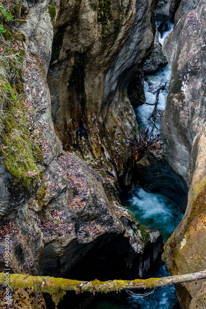 Deep Mostnica canyon, fast river in Triglav National Park (Mostnice Korita), Slovenia during March Deep Mostnica canyon, fast river in Triglav National Park (Mostnice Korita), Slovenia during March