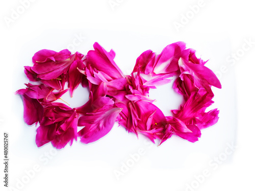 March 8 from flower petals on a white background. congratulations postcard holiday. floral leaves on the table for the holiday .. postcard, congratulations to March 8. women's Day. valentine's day