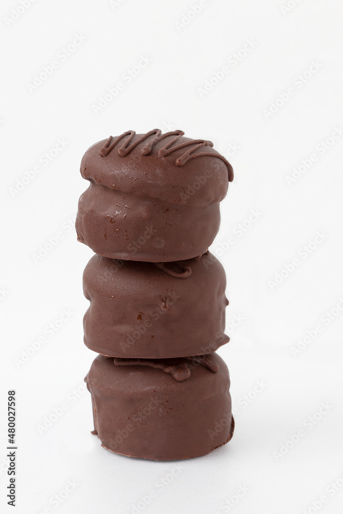 Pile of honey cookies of dulce de leche isolated on white background