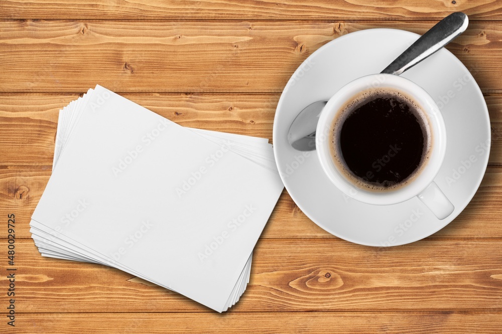 New year concet for review text on a napkin with a cup of coffee, end of year business concept New year concet for review text on a napkin with a cup of coffee, end of year business concept
