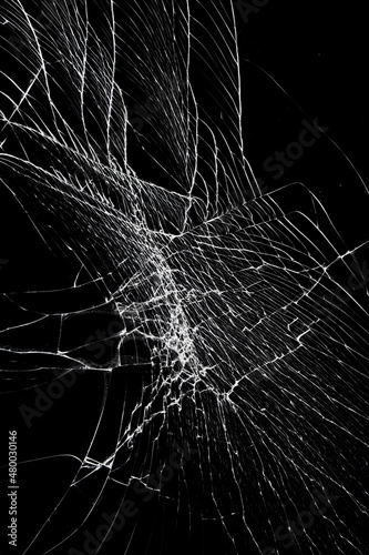 Cracked broken glass screen protection of smartphone or tablet. Damaged screen effect
