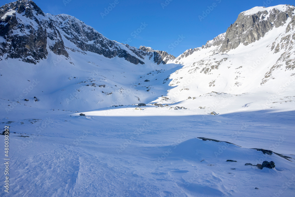 Slovak High Tatras in winter. Kotlina Piatich Spisskych plies.