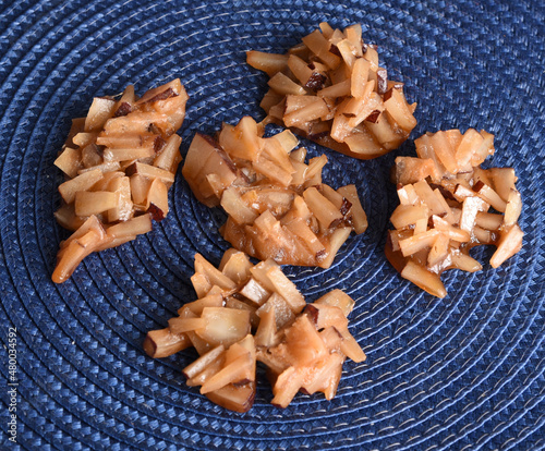 Jamaican coconut drops on blue straw mat