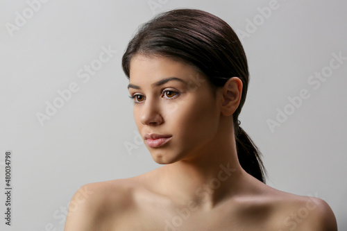 Beauty portrait of gorgeous young woman, close up, studio shot