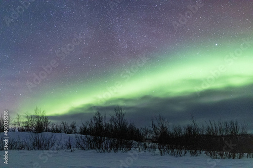 Soft Nothern Lights under the Milky Way. Taken in Swedish Lapland.