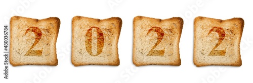 Foto 2022 written on toasted slices of bread, food new year concept