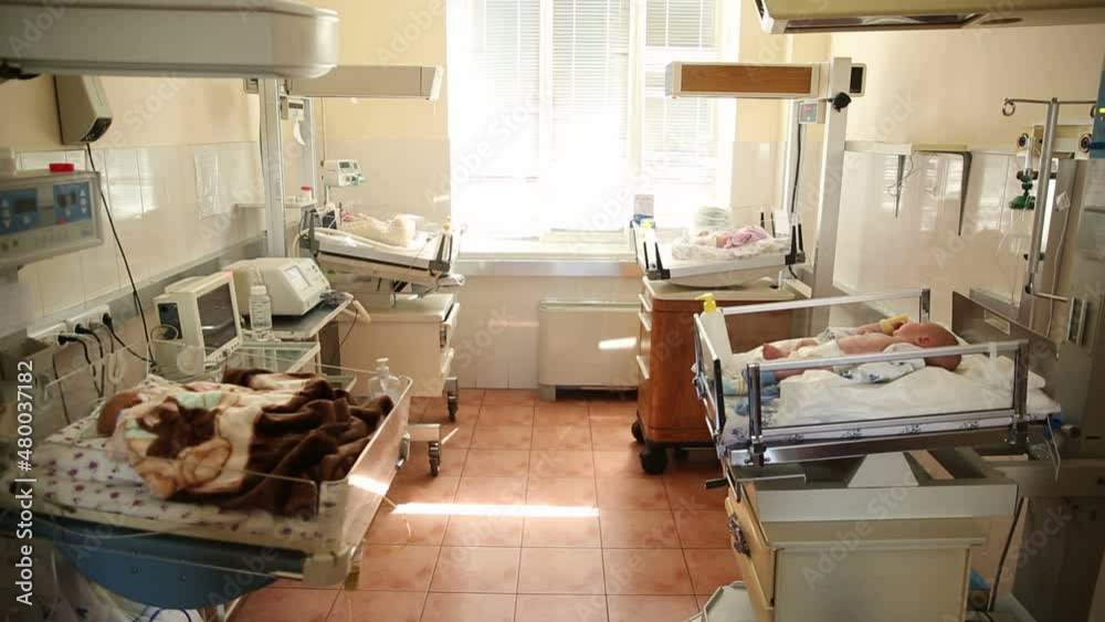 Labour ward with incubators for babies. New born premature baby in incubator. Newborn in child hood,labour room in hospital Labour ward with incubators for babies. New born premature baby in incubator. Newborn in child hood,labour room in hospital