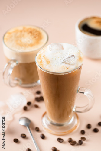 Fototapeta Naklejka Na Ścianę i Meble -  Cup Of Ice Latte Coffee In Glass Cup Closeup View. Refreshing Summer Cold Coffee
