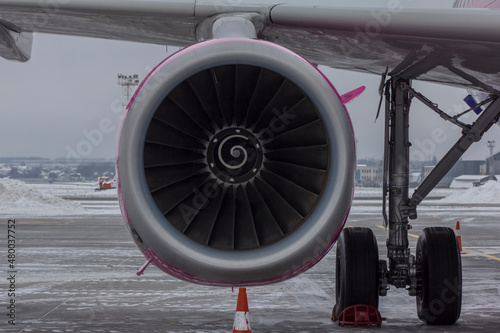 Aircraft jet engine with traces of operation and carbon deposits from fuel, turbine blades, airliner engine © Akeksey