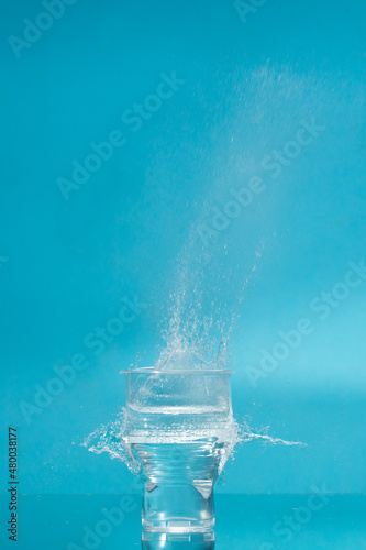 A plastic cup with a water freeze after pneumatic bullet