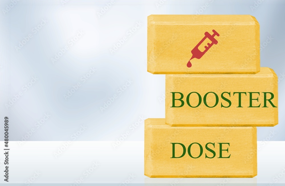 Yellow block with syringe injection symbol and text BOOSTER DOSE Yellow block with syringe injection symbol and text BOOSTER DOSE
