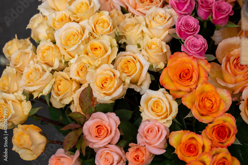 A flower bouquet with many colorful rose blooms