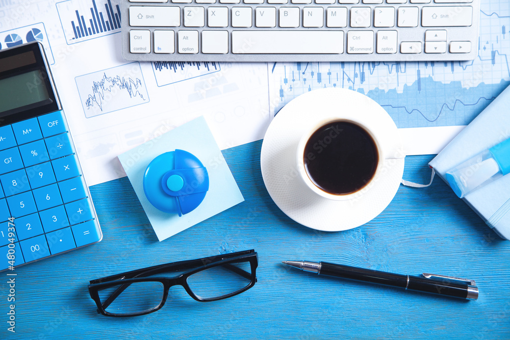Business graphs, computer keyboard, coffee, pen, eyeglasses. Business. Analysis. Accounting Business graphs, computer keyboard, coffee, pen, eyeglasses. Business. Analysis. Accounting