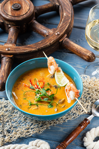 Tom yam on coconut milk with lemongrass and shrimp