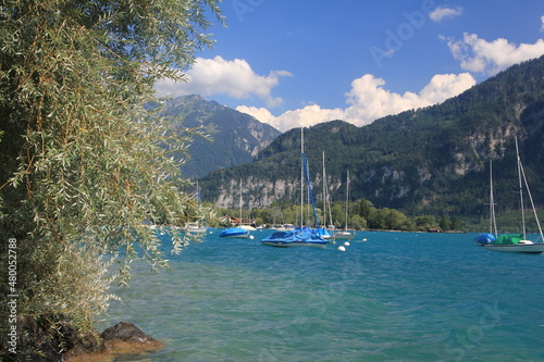 beautiful mountain lake with luxury yachts against the backdrop of mountains