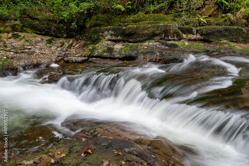 Long exposure of a waterfall on the East Lyn River at Watersmeet in Exmoor National Park