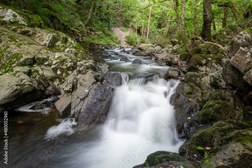 Long exposure of a waterfall on the East Lyn River at Watersmeet in Exmoor National Park
