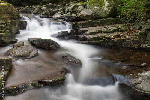 Long exposure of a waterfall on the East Lyn River at Watersmeet in Exmoor National Park