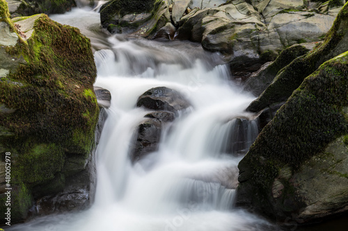 Long exposure of a waterfall on the East Lyn River at Watersmeet in Exmoor National Park