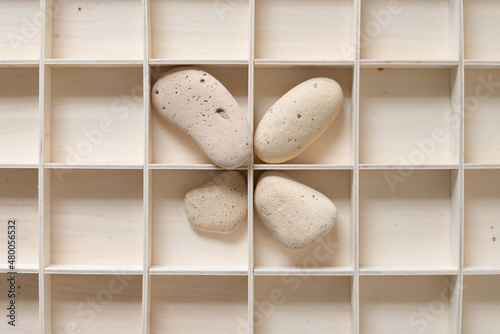 Canvas Print objects found on an urban beach and a wooden box with square spaces