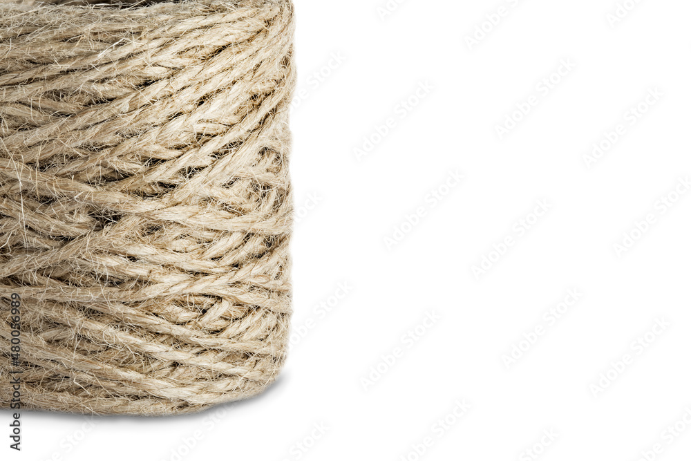 Roll of natural jute twine isolated on a white background. Roll of natural jute twine isolated on a white background.
