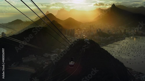 Rio de Janeiro cityscape and Sugarloaf Cable Car at sunset inRio de Janeiro, Brazil. photo