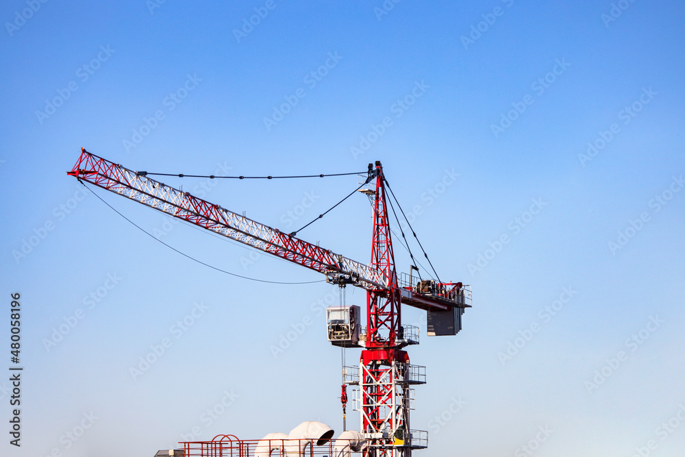 Tower crane on the construction site Tower crane on the construction site