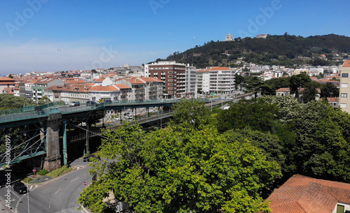 Viana do Castelo, Portugal, June 10, 2021: The Gustave Eiffel Bridge over the river Lima in Viana do Castelo. Aerial panoramic cityscape view of Viana and the Marina.