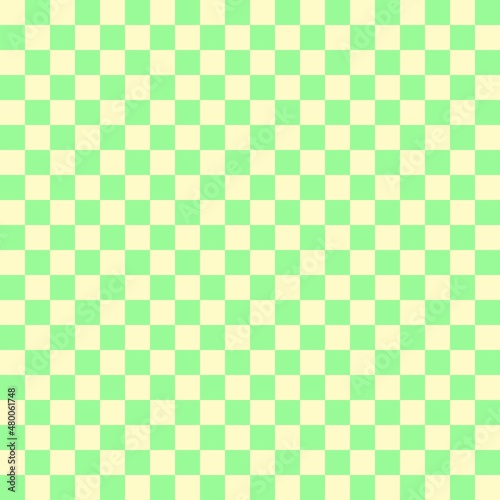 Two color checkerboard. Pale Green and Beige colors of checkerboard. Chessboard, checkerboard texture. Squares pattern. Background.