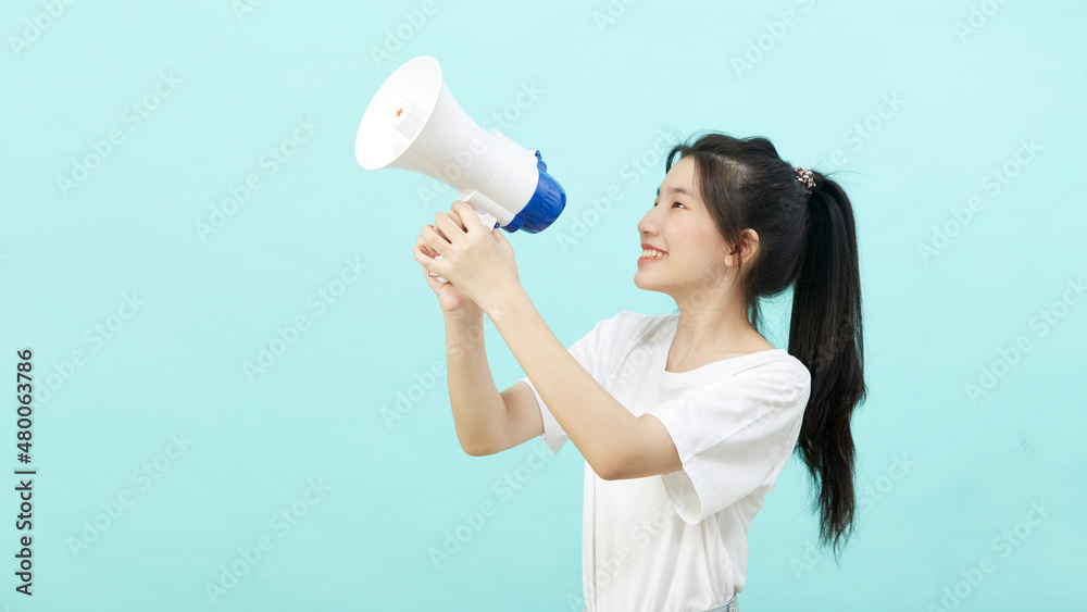 Portrait beautiful young woman smile with megaphone Portrait beautiful young woman smile with megaphone