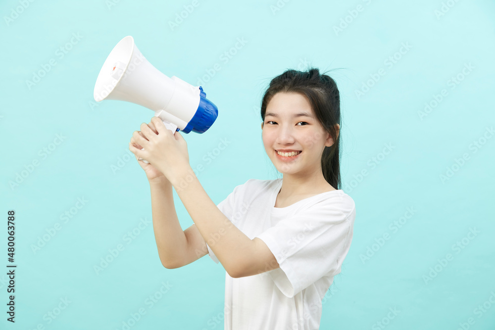 Portrait beautiful young woman smile with megaphone Portrait beautiful young woman smile with megaphone
