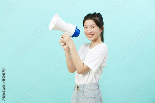Portrait beautiful young woman smile with megaphone