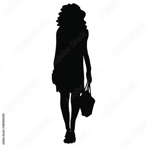 Standing young woman in short summer dress holding bag. Black silhouette on white background.